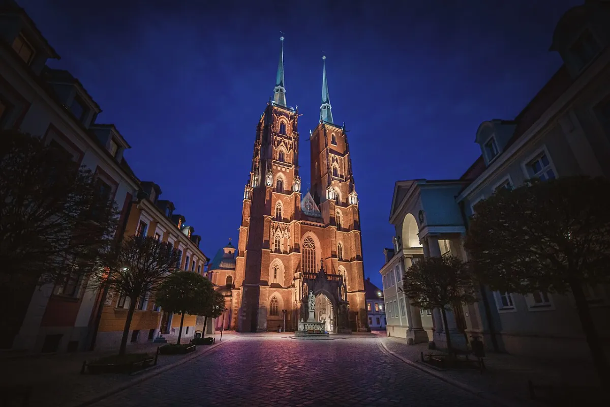 Ostrow Tumski cathedral illuminated at night in Wroclaw